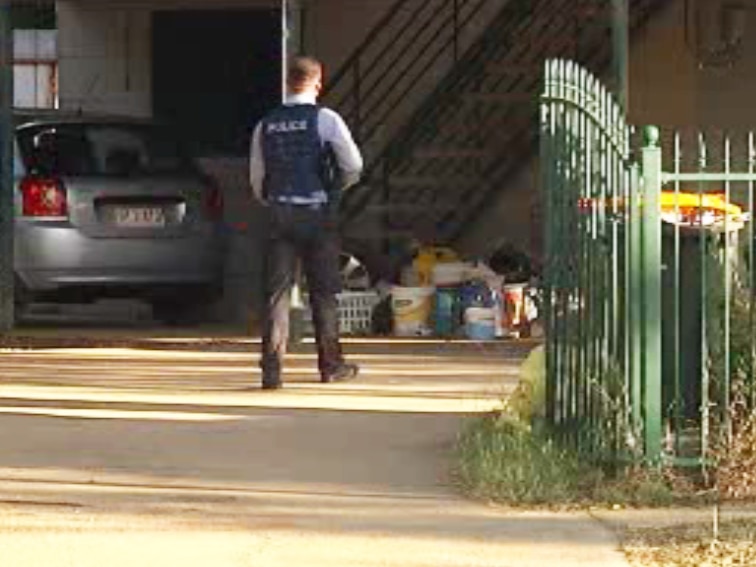 Police at the scene of a man's death in Wagaman