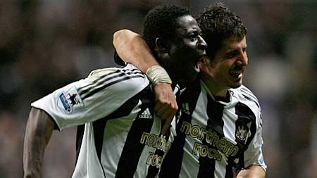 Martins and Emre celebrate for Newcastle United