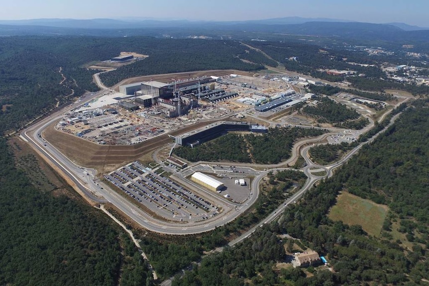 An aerial view shows the ITER site spanning across the French countryside