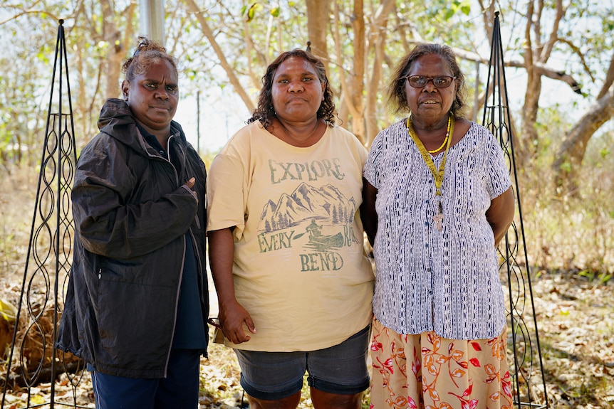 three aboriginal women looking at the camera