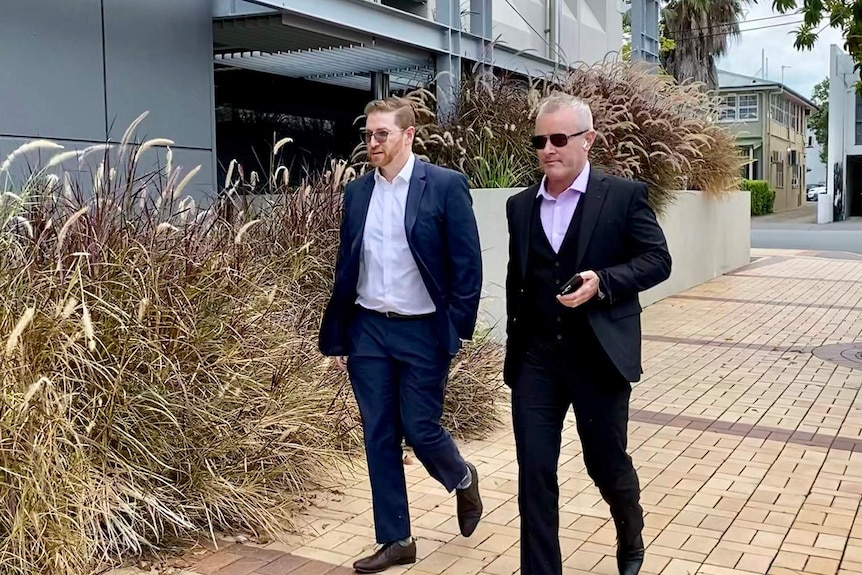 Jayden Moorea and his barrister Angus Edwards leave the Southport Magistrates Court on Friday.