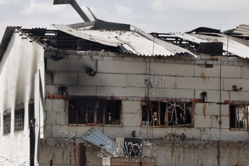 View of burnt out prison building.