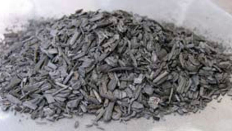 Close up photo of biochar, a charcoal that can be used to store carbon.