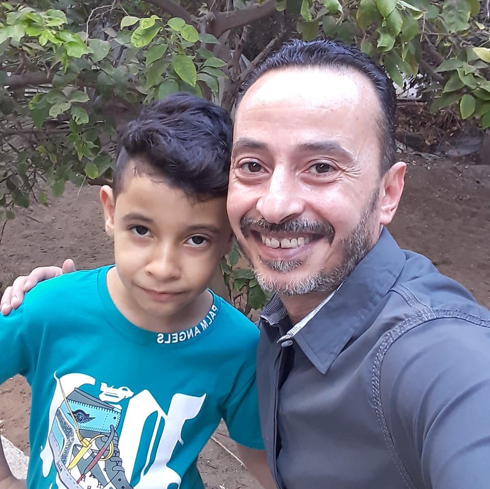 Hazem Sabawi with his son Kareem in Gaza.