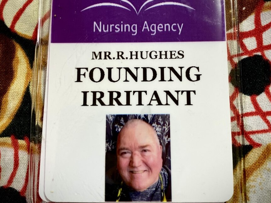 ID badge of Robert Hughes with the title of Founding Irritant