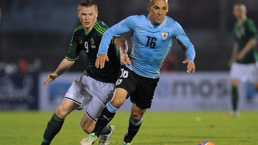 Uruguay's Maximiliano Pereira against Northern Ireland