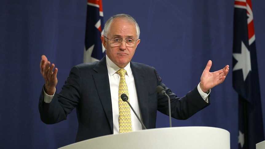 Australian Prime Minister Malcolm Turnbull gestures during a press conference at the Commonwealth Parliamentary Offices