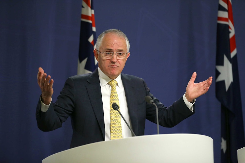 Australian Prime Minister Malcolm Turnbull gestures during a press conference at the Commonwealth Parliamentary Offices