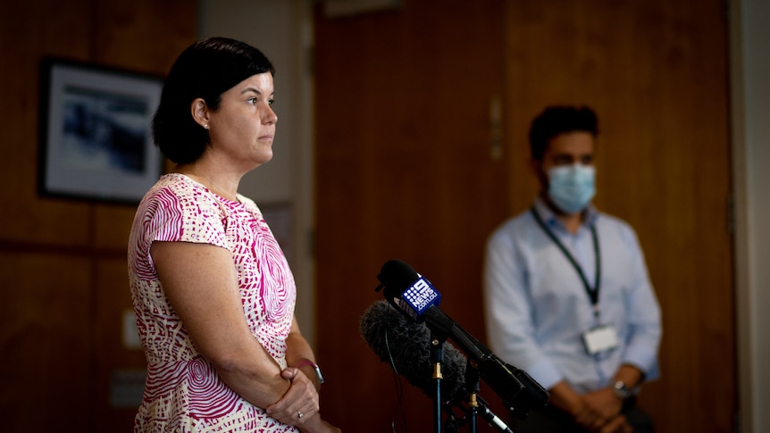 Health Minister Natasha Fyles and Acting Deputy Chief Health Officer Marco Briceno speaking at a press conference.