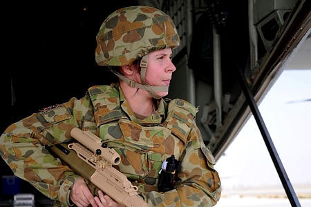 Female soldier with rifle