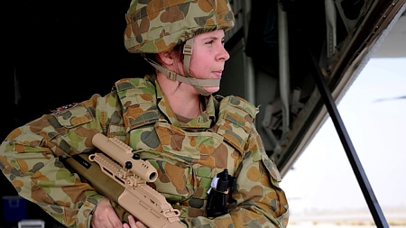 Female soldier with rifle