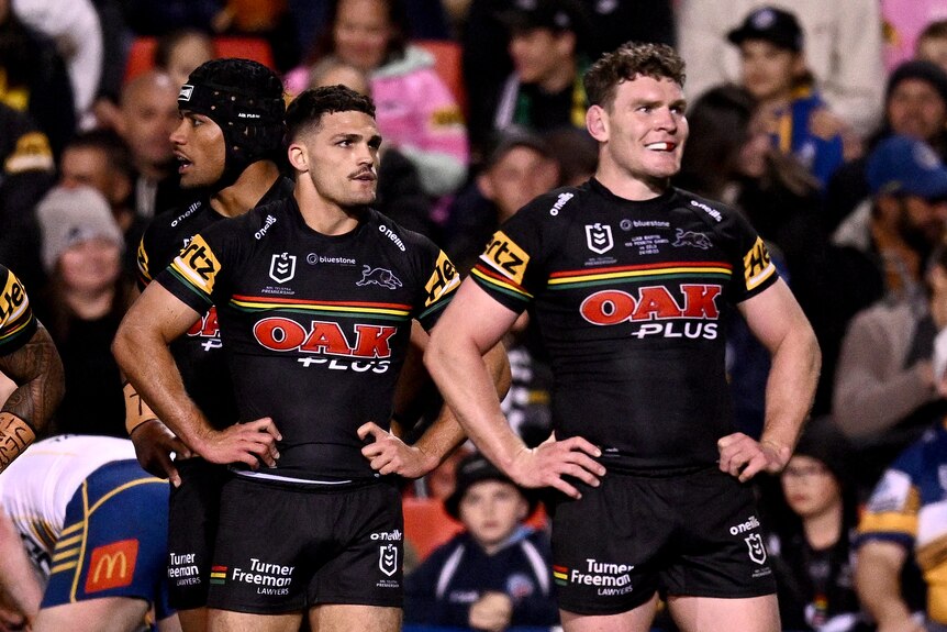Nathan Cleary and Liam Martin look disappointed with their hands on their hips