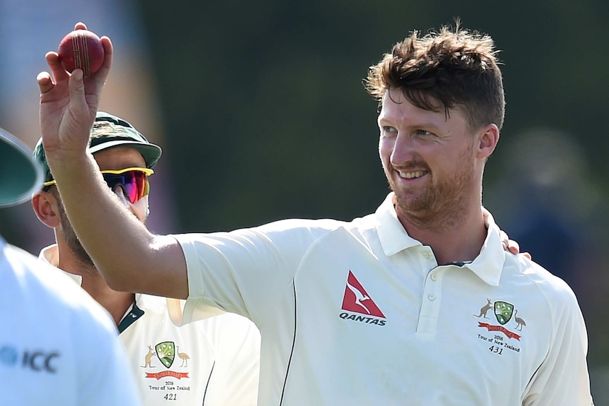 Australian Test bowler Jackson Bird shows the ball after taking five wickets against New Zealand.