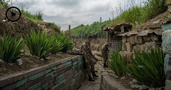 Soldiers in a trench.