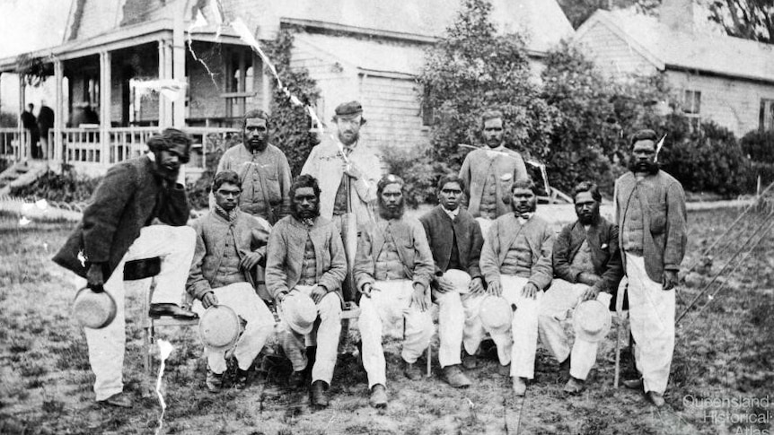 The Aboriginal cricket team pictured with their captain and coach Tom Wills at the Melbourne Cricket Ground, December 1866. (Public Domain)
