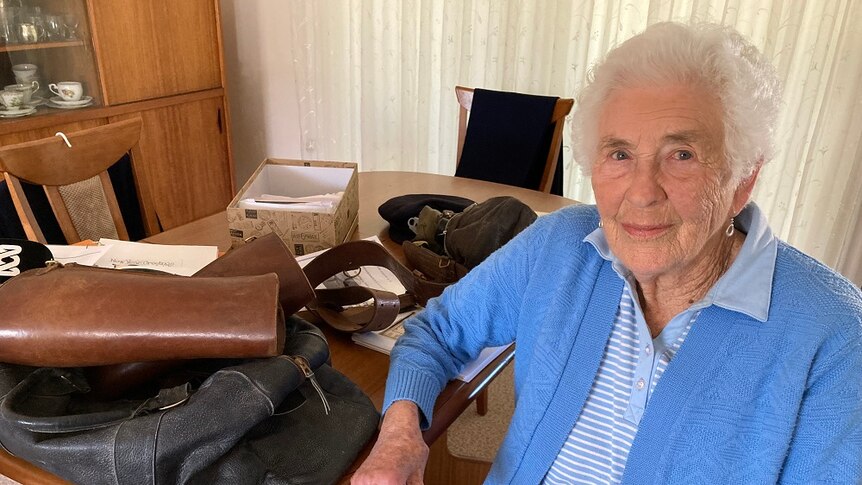 Wagga resident Nola Scott sits beside her father's World War One memorabilia