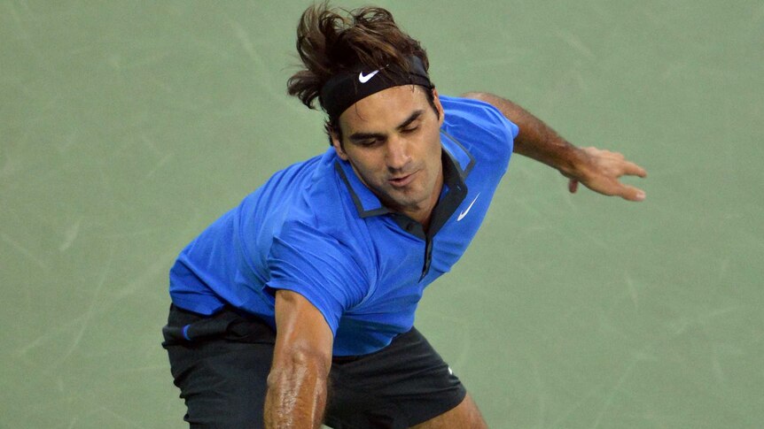 Federer advances in Shanghai