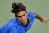 Federer advances in Shanghai