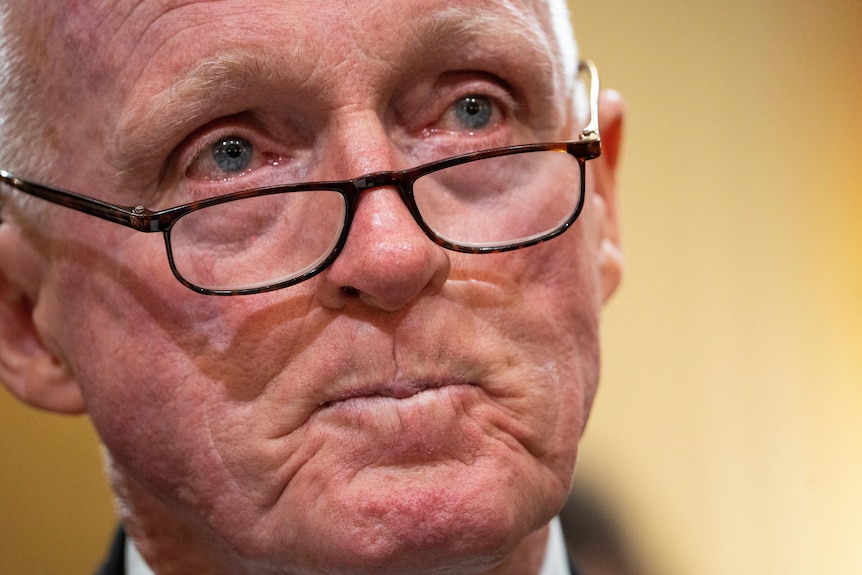 Close up of emotional Arizona House Speaker Rusty Bowers, with tears in his eyes