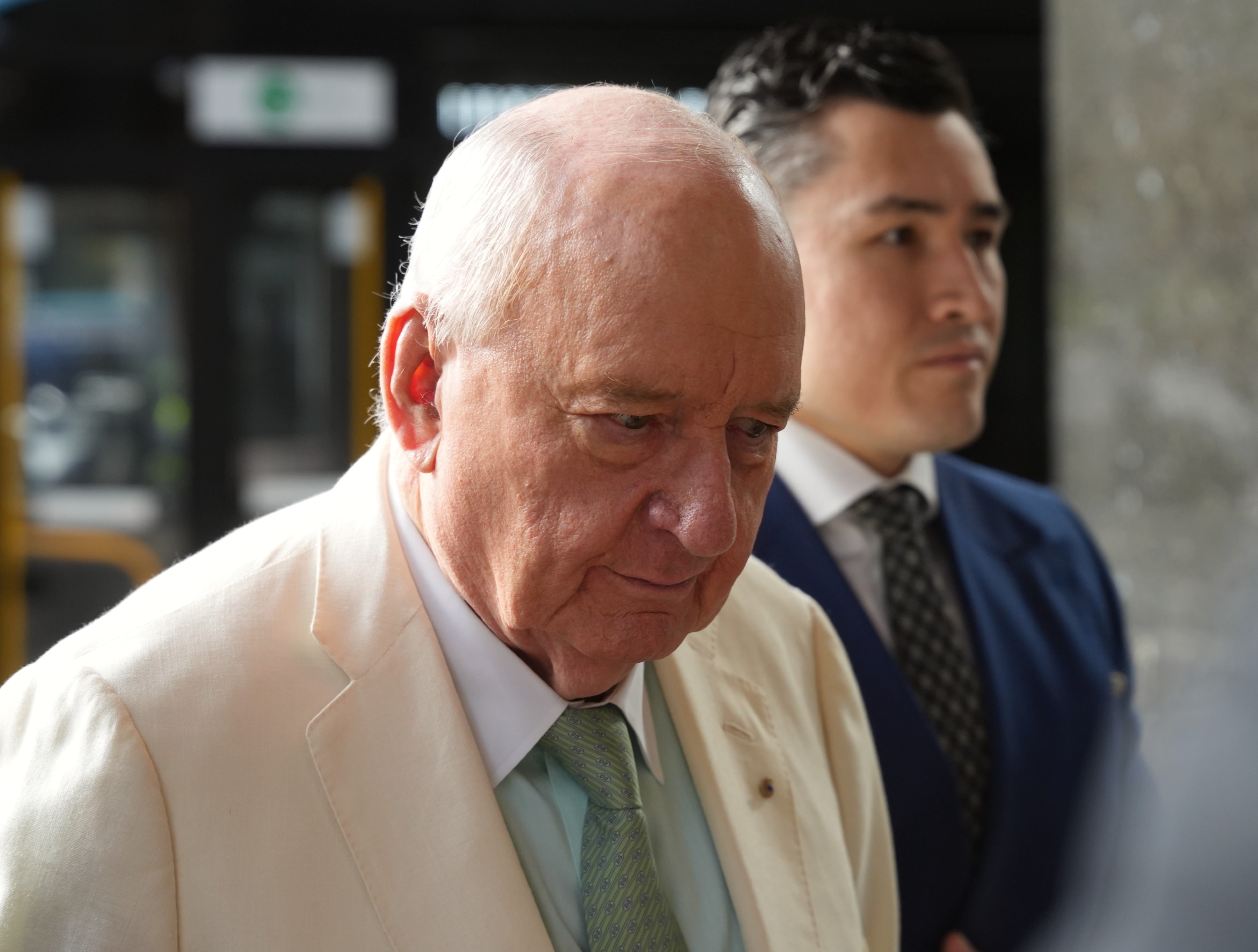 Complainant 'distraught' when Alan Jones put hand under table, trial hears