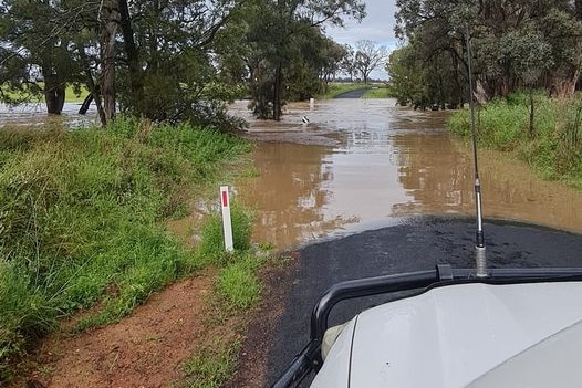 A road covered in floodwater
