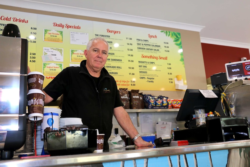 Stickybeak cafe owner Roy Ketjer at his counter.