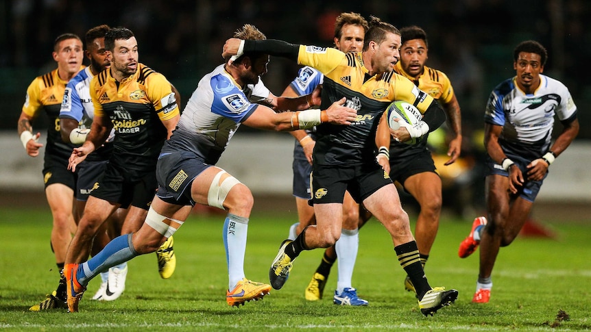 Cory Jane fends off the Western Force defence