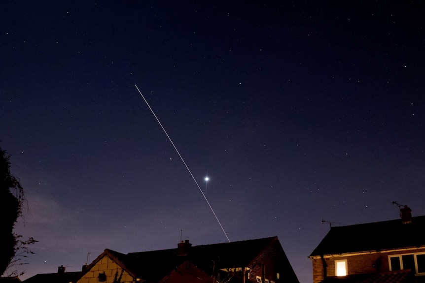 The International Space Station cutting between Venus and Mars