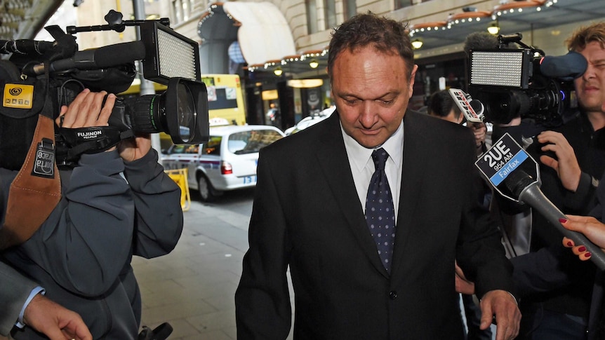 Former AWU official Bruce Wilson arrives to give evidence at the Royal Commission into Trade Union Governance and Corruption.