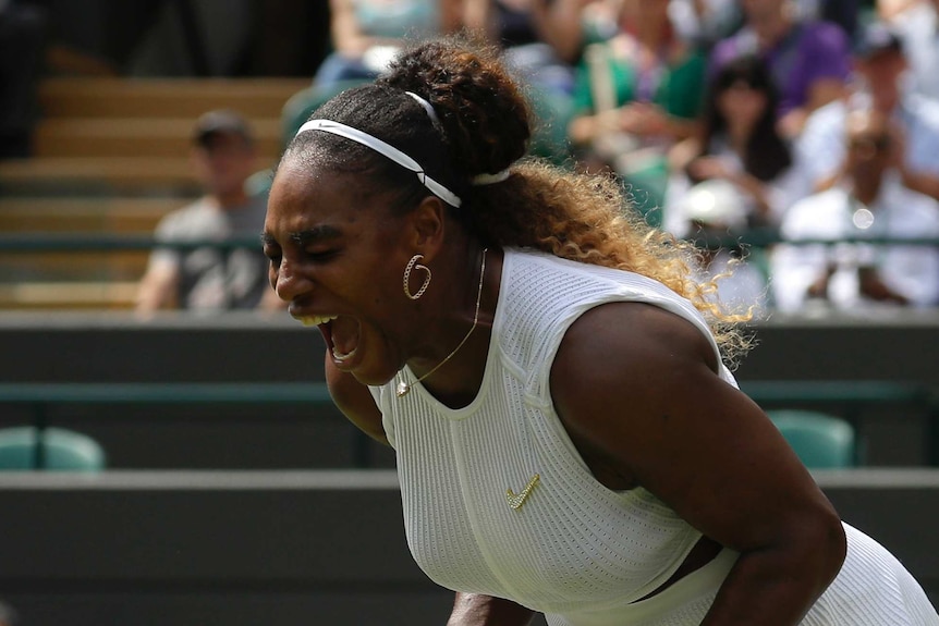 Serena Williams screams and bends over