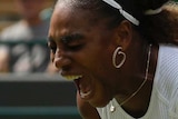 Serena Williams screams and bends over