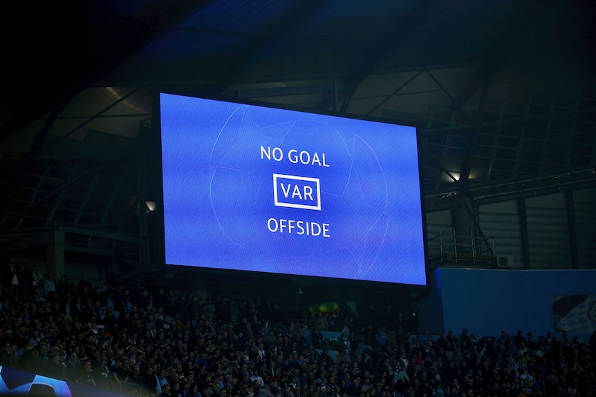 A big blue screen shows "NO GOAL VAR OFFSIDE".