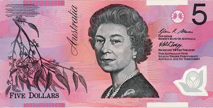 A purple $5 Australian bank note with the face of Queen Elizabeth II.