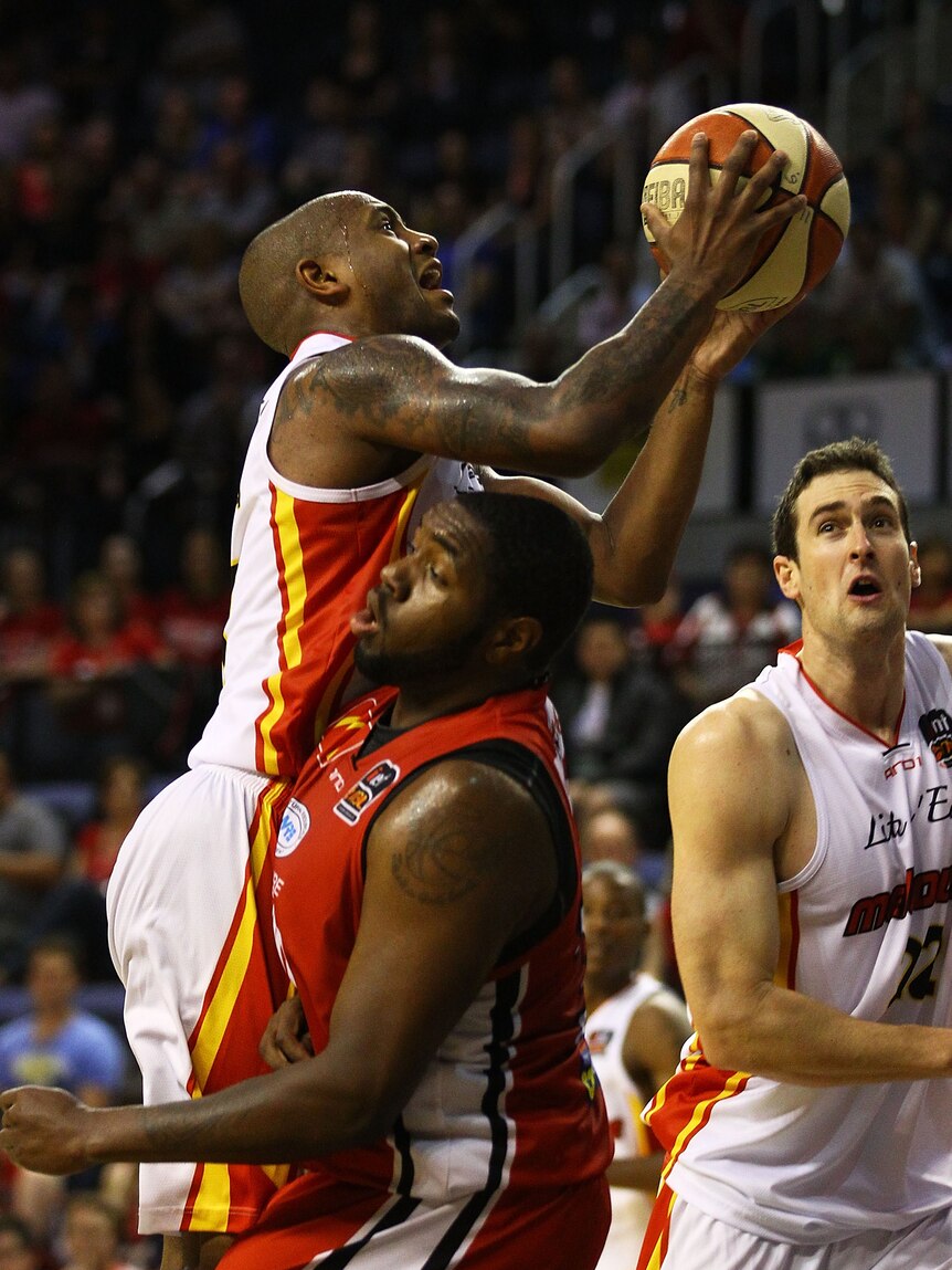 Starring role ... Ayinde Ubaka drives to the basket against Wollongong. (Getty: Mark Nolan)