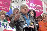 Jay Leno speaks at a rally of women's groups and homosexual rights groups protesting outside the Beverly Hills Hotel.