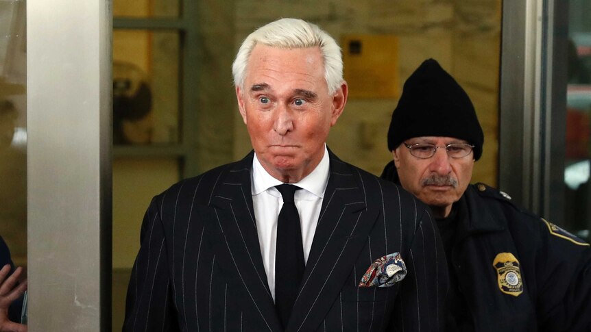 Former campaign adviser for President Donald Trump Roger Stone leaves federal court.
