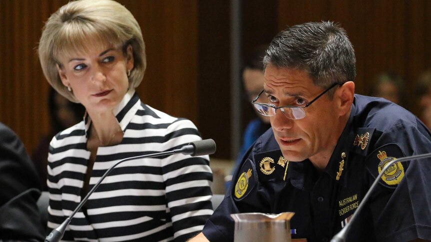 Australian Border Force Commissioner Roman Quaedvlieg and Senator Michaelia Cash