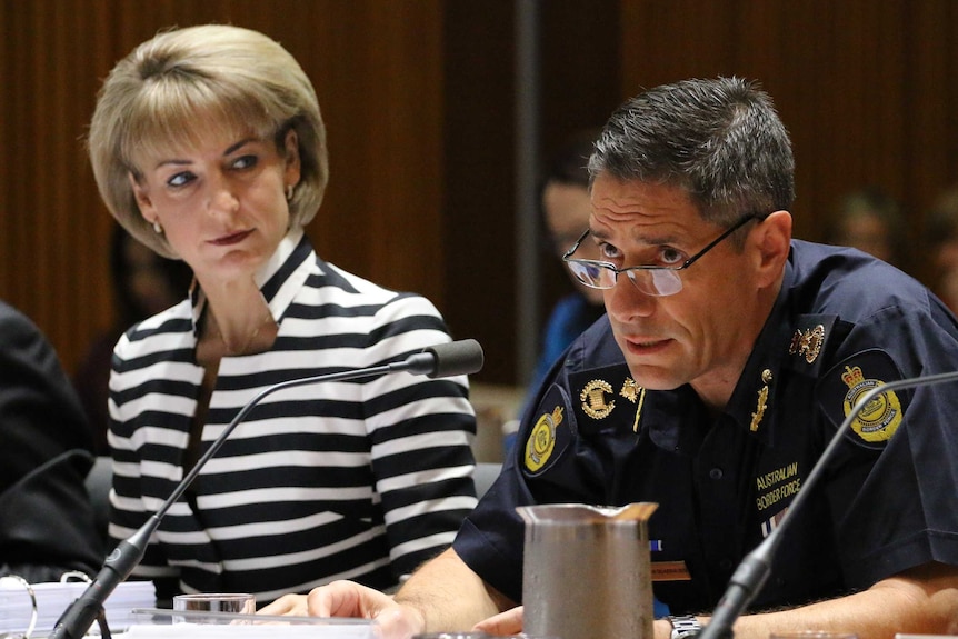 Australian Border Force Commissioner Roman Quaedvlieg and Senator Michaelia Cash