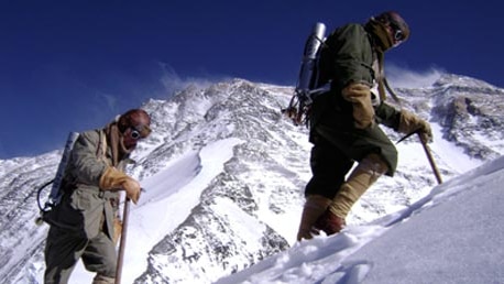 Men climbing Everest