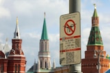 A sign prohibiting unmanned aerial vehicles flying over the area is on display near the Kremlin wall.