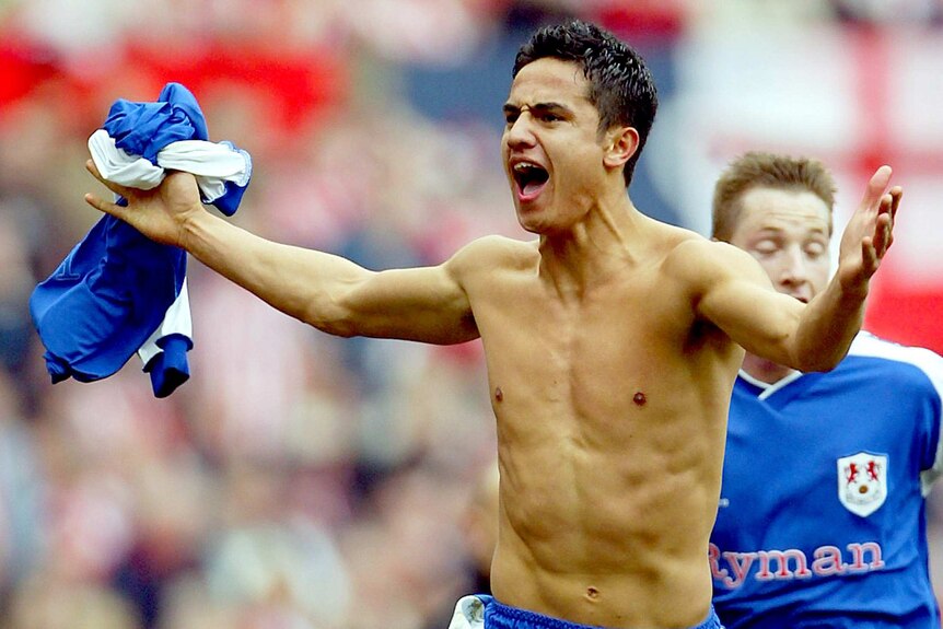 Tim Cahill celebrates with his shirt off after he scored for Millwall in the 2004 FA Cup semi-final.