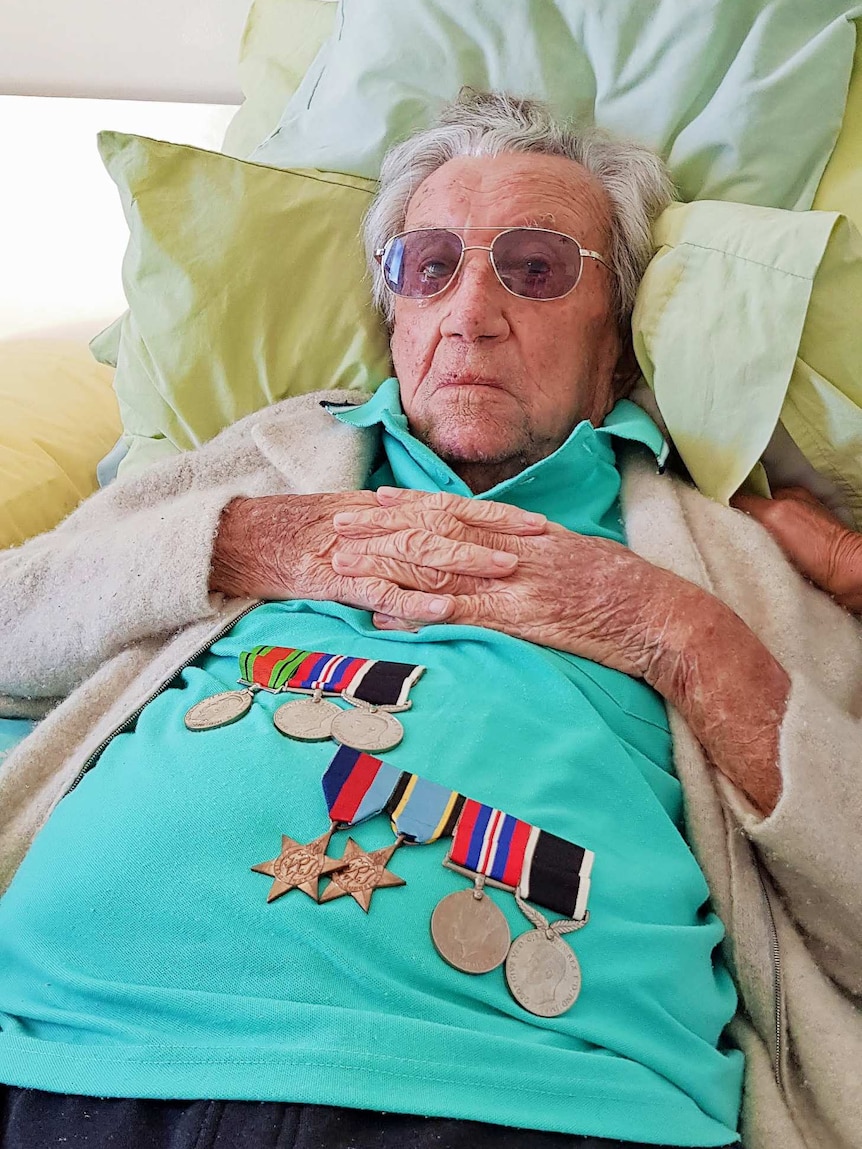 War veteran, Louis Smit lies in bed