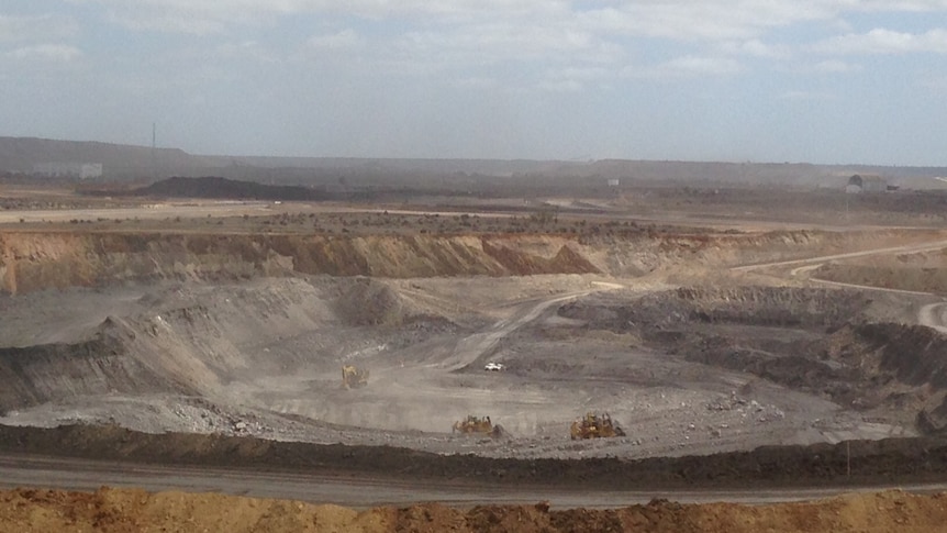 A picture of an open cut coal mine.
