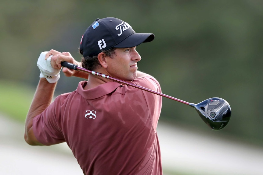 Adam Scott tees off on the third hole at the Masters