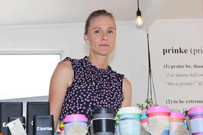 Photo shows Claire Quintal standing in her eco store 'Prinke' on Norfolk Island.