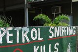 Petrol sniffing kills sign