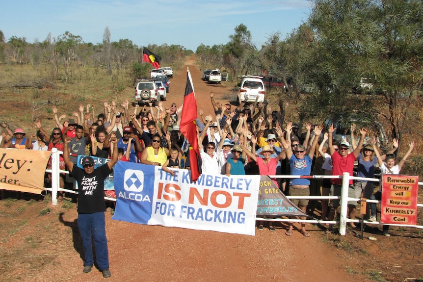 A group of people at a demonstration against hydraulic fracturing near Broome.