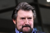 Found guilty: Derryn Hinch leaves court with his wife Chanel