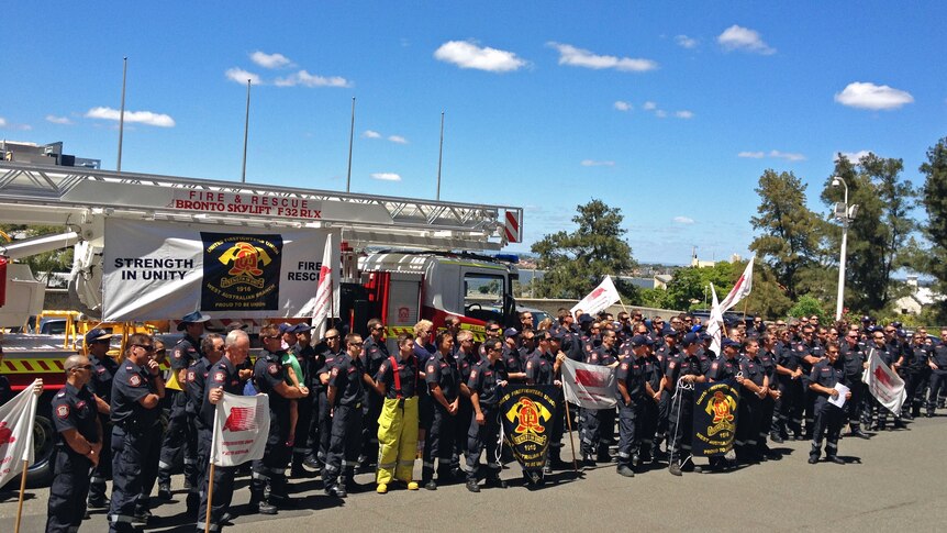 Firefighters rally at parliament