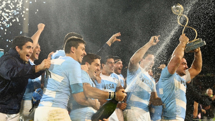 Winners are grinners ... Argentina celebrates its win over the Wallabies in 2014